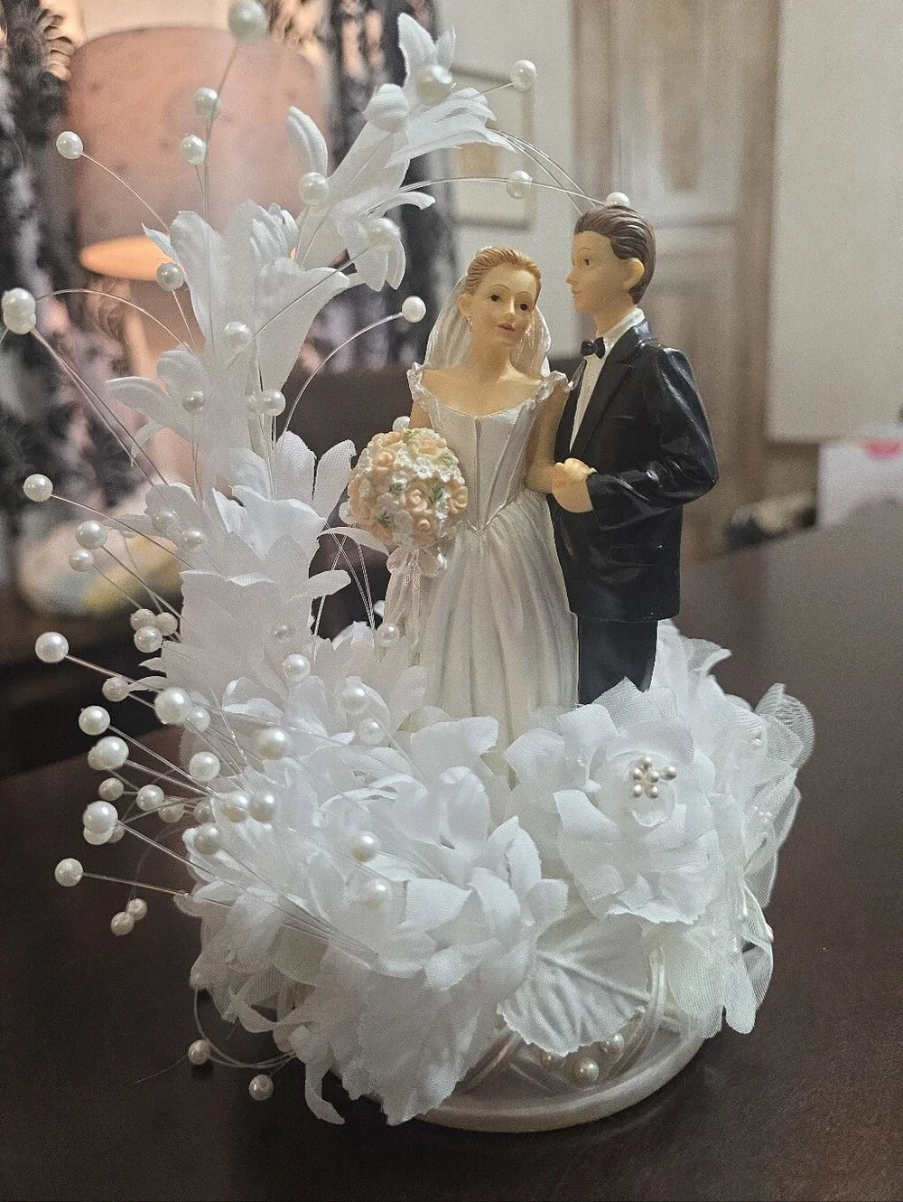 White Bride and Groom Wedding Cake Topper with Pearl Floral Accents